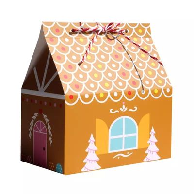 La casa forma las cajas de regalo de la Navidad para el cartón disponible del caramelo
