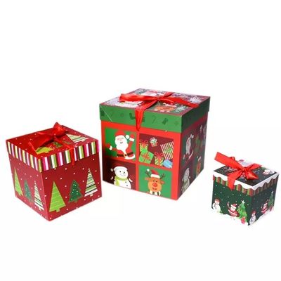Tapa y caja baja de las decoraciones de la Navidad de las cajas de regalo de la cartulina de la Navidad con la cinta